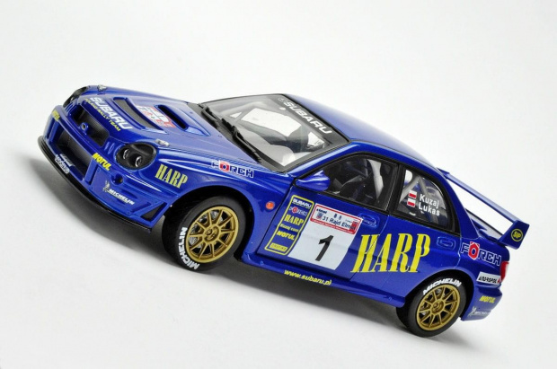 Subaru Impreza WRC #1 L.Kuzaj/M.Lukas 31 Rajd Elmot 2003 - 1:18 Solido