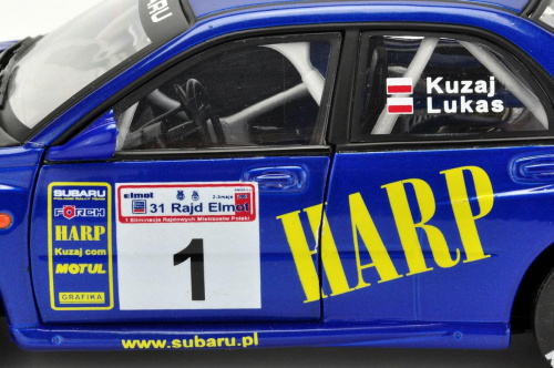 Subaru Impreza WRC #1 L.Kuzaj/M.Lukas 31 Rajd Elmot 2003 - 1:18 Solido