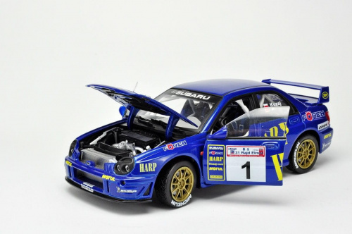 Subaru Impreza WRC #1 L.Kuzaj/M.Lukas 31 Rajd Elmot 2003 - 1:18 Solido