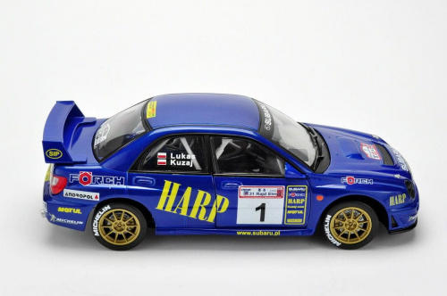 Subaru Impreza WRC #1 L.Kuzaj/M.Lukas 31 Rajd Elmot 2003 - 1:18 Solido