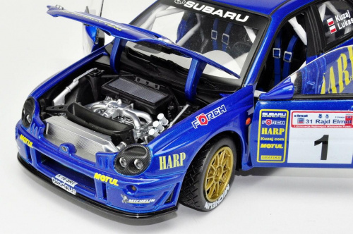 Subaru Impreza WRC #1 L.Kuzaj/M.Lukas 31 Rajd Elmot 2003 - 1:18 Solido