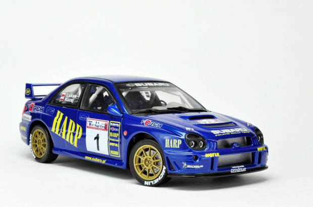 Subaru Impreza WRC #1 L.Kuzaj/M.Lukas 31 Rajd Elmot 2003 - 1:18 Solido