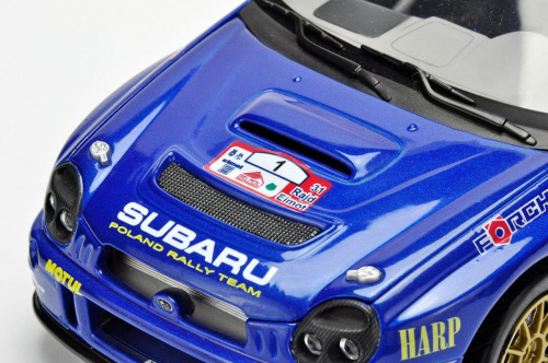 Subaru Impreza WRC #1 L.Kuzaj/M.Lukas 31 Rajd Elmot 2003 - 1:18 Solido